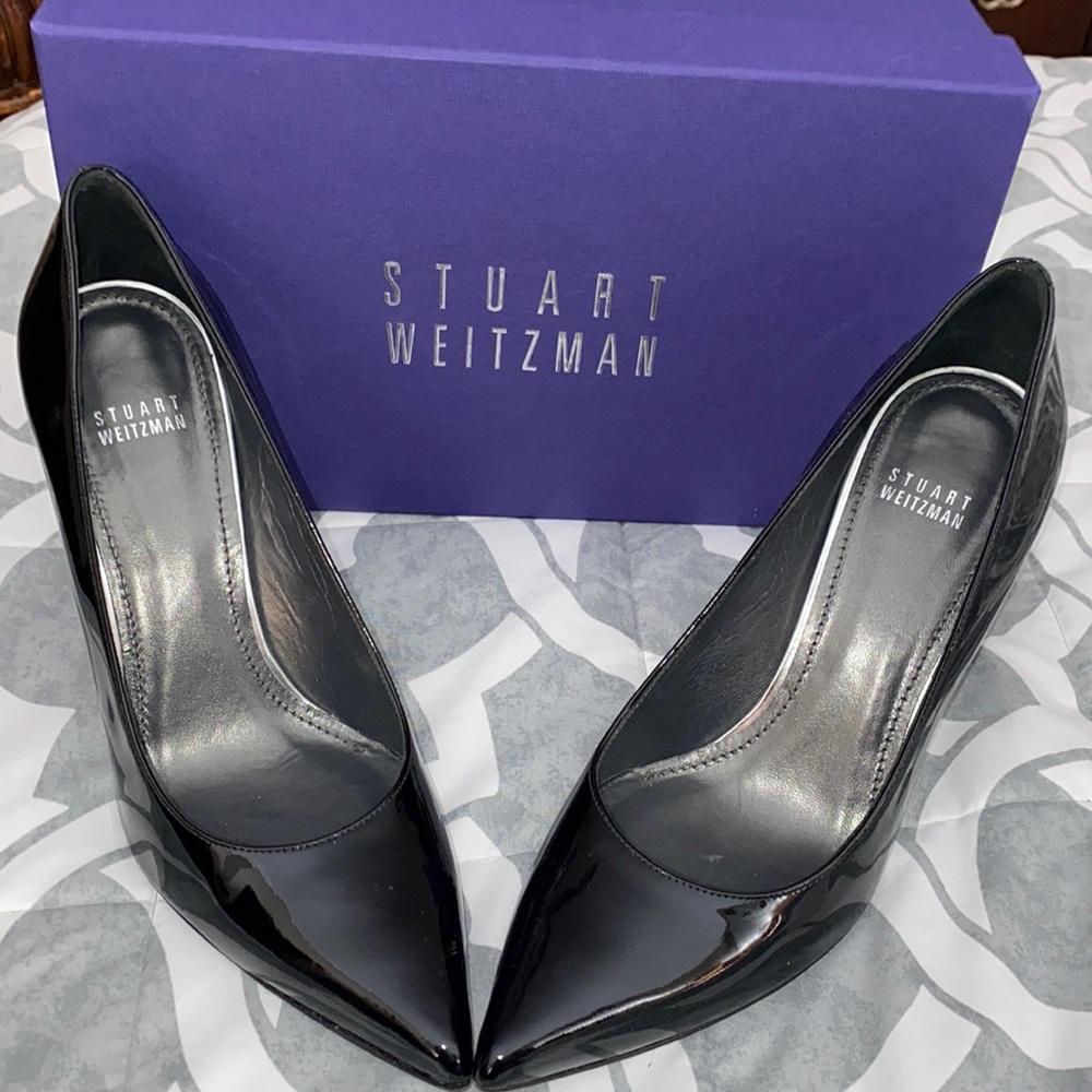 Stuart Weitzman black patent leather heels.